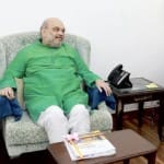 अमित शाह और योगी आदित्यनाथ।