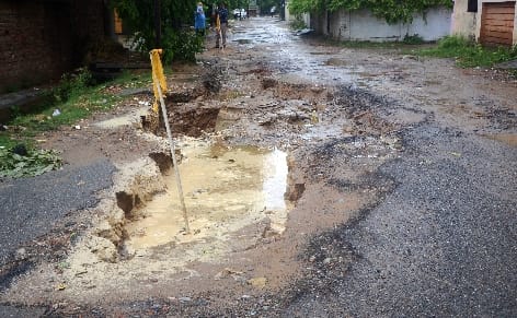The road got submerged in the first rain due to improvised construction