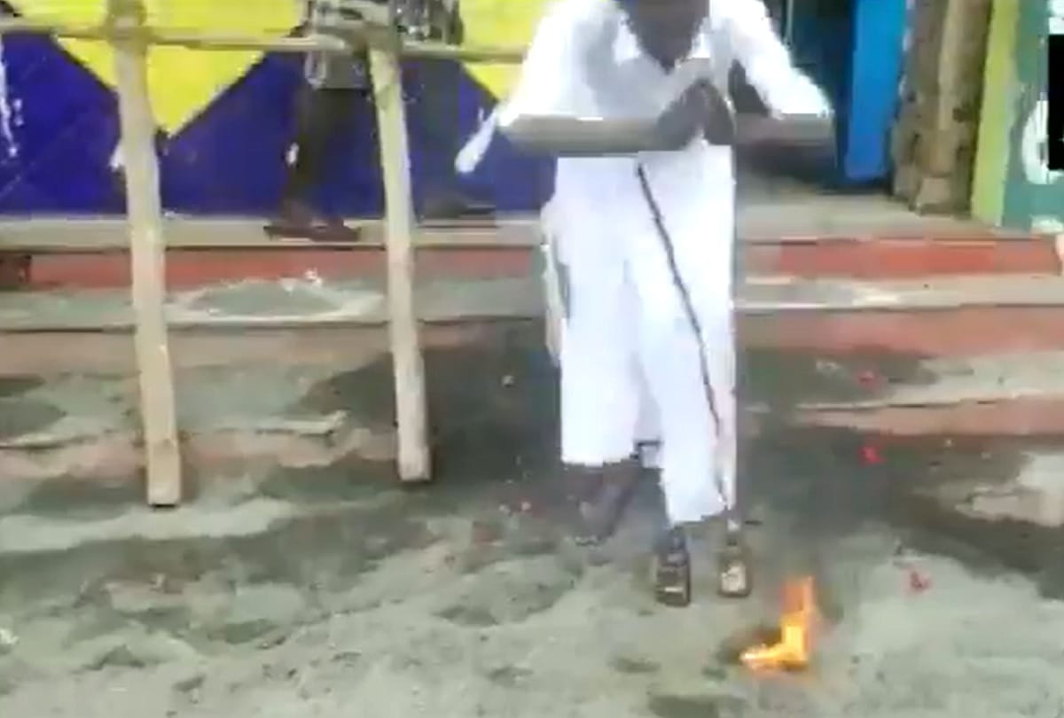 Madurai: worships bottles of liquor after Tamil Nadu govt permits the reopening of liquor shops in the state