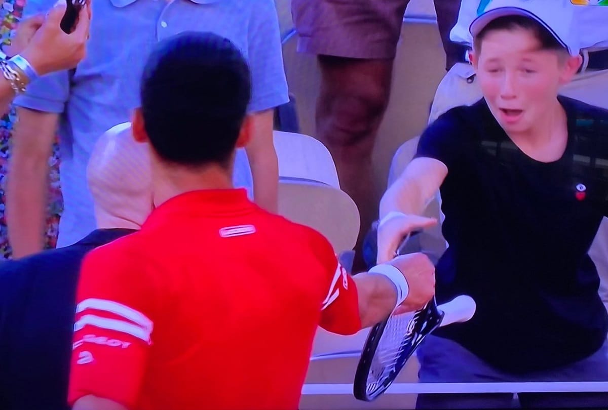 french open 2021 champion Novak Djokovic gives racket to young kid he rejoices watch this beautiful video