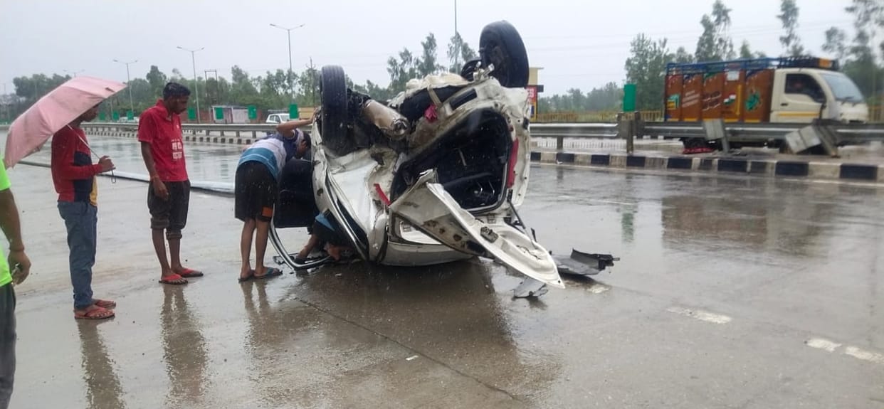 The car overturned after colliding with the divider, four youths were serious