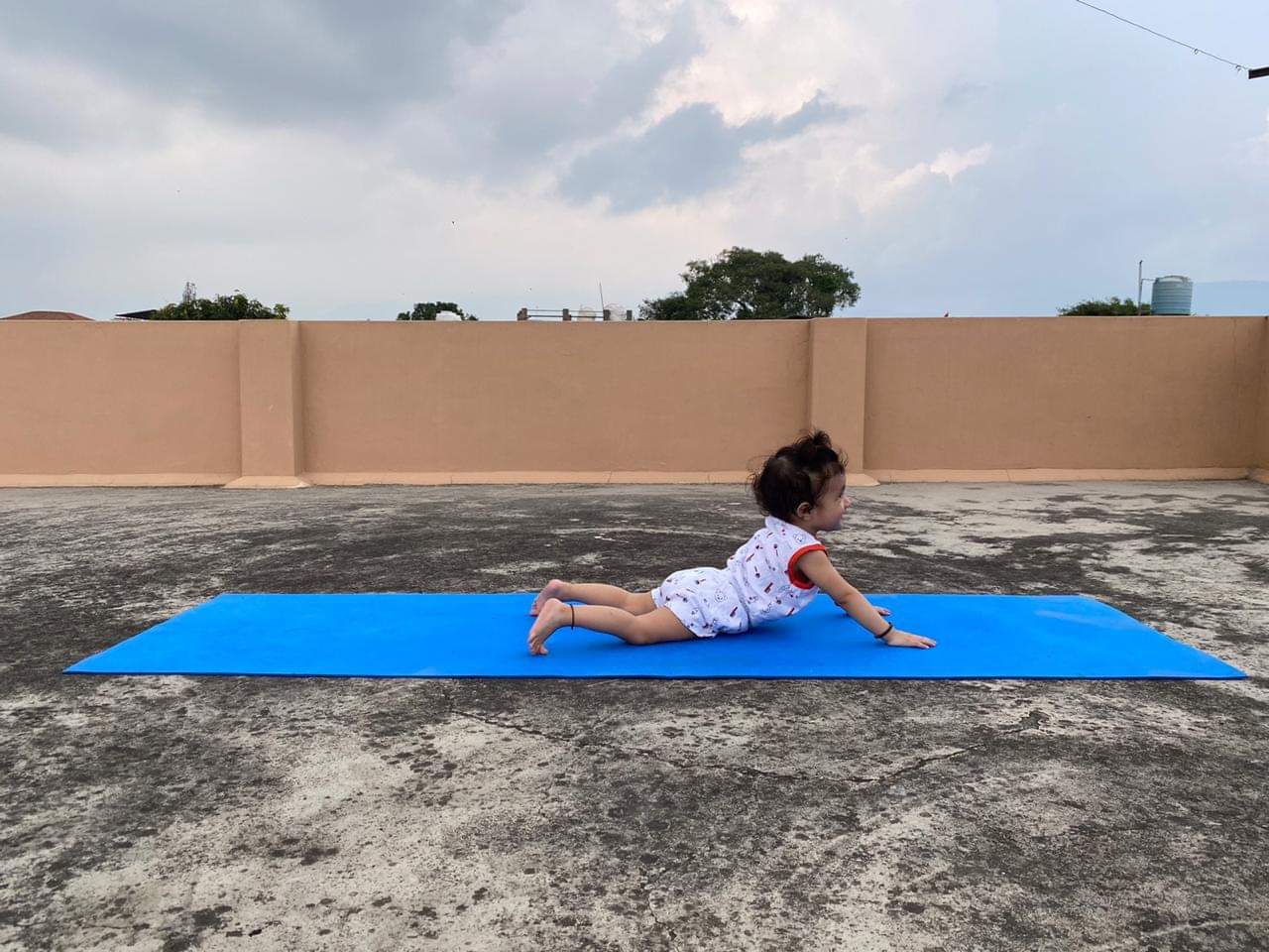 international yoga day 2021 : two and half year girl doing yoga