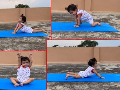 international yoga day 2021 : two and half year girl doing yoga