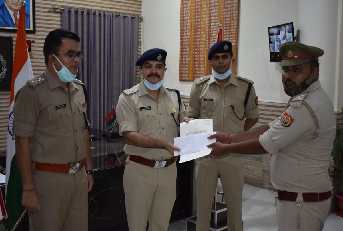 Police official awarded for bravely saving drowning man in river Gange in Aligarh