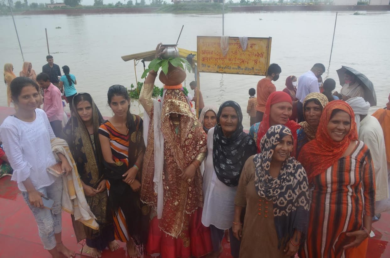 Crowd of devotees gathered on the Ganges bath in Shukratal
