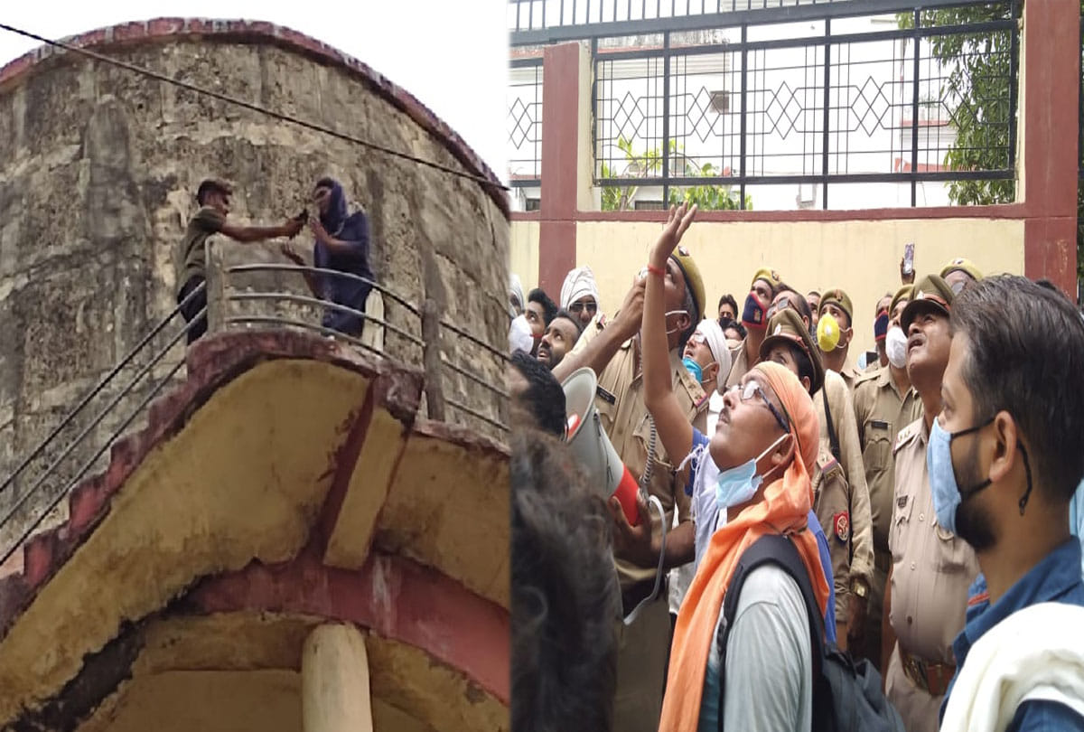 lady climbed on water tank in banda