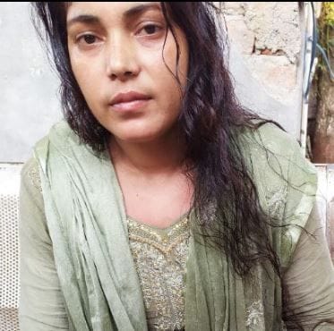 Trying to burn the wife by pouring kerosene for not giving dowry