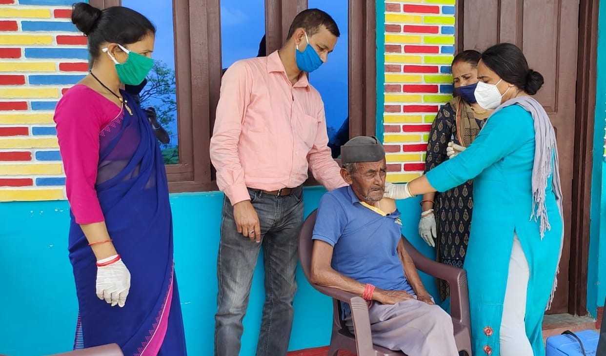 The team reached Satkula by walking six km to get the vaccine