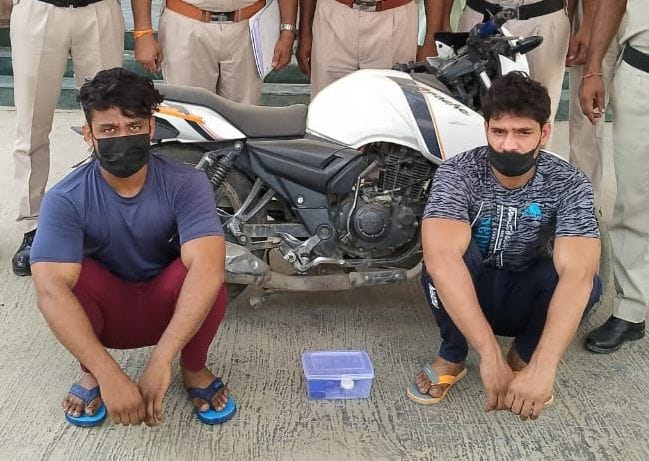 Bike, cash and weapons recovered from the accused of murder