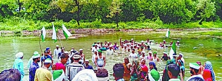 Villagers troubled by dirt and flies did water satyagraha