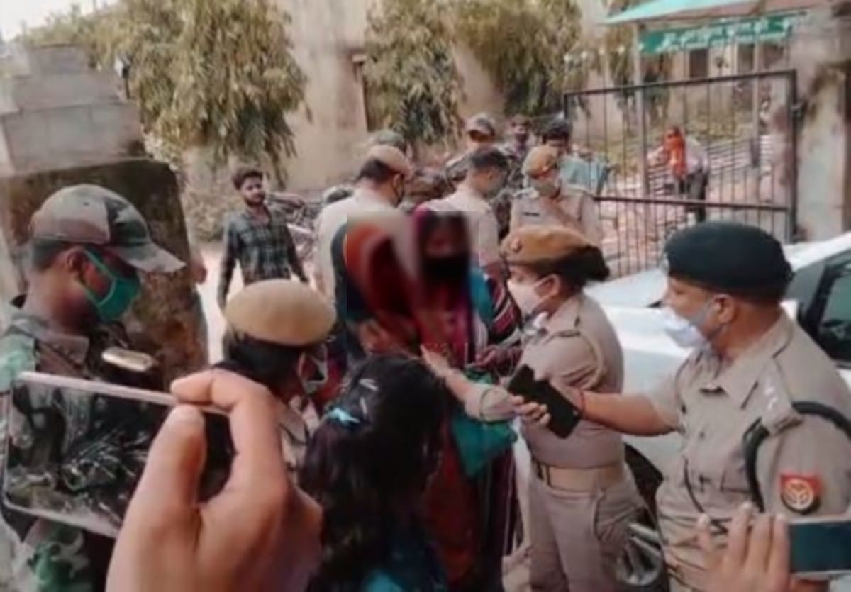 Sexual assault victim sit in front of SP car stopped way complaint for arresting of accused in mirzapur