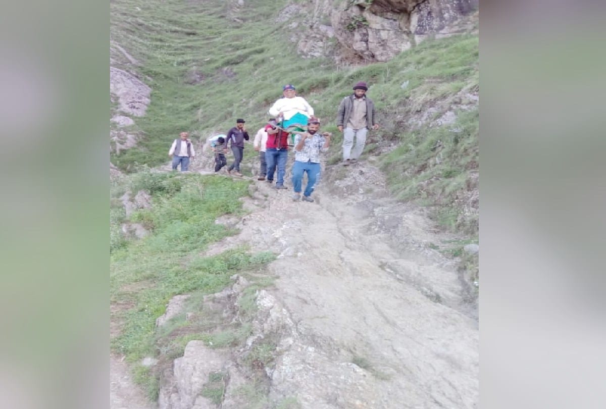 poor road connectivity: A sick woman carried on a chair to the road five kilometers away