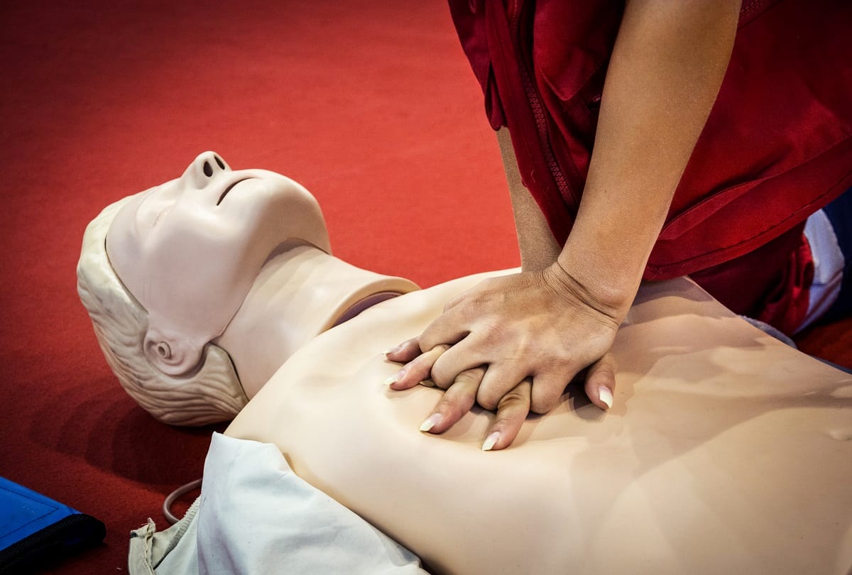 Heart Attack : Doctor is teaching how to give CPR
