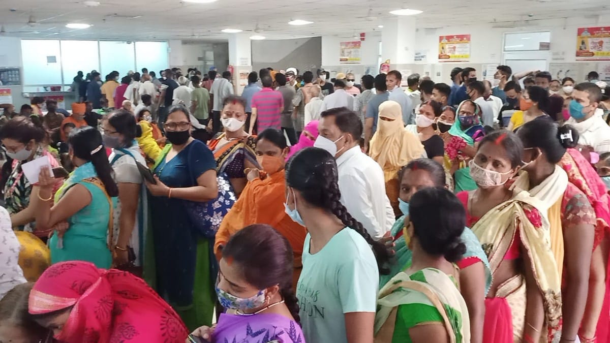Crowd at vaccination centers for vaccine not following social distancing and wear mask in varanasi