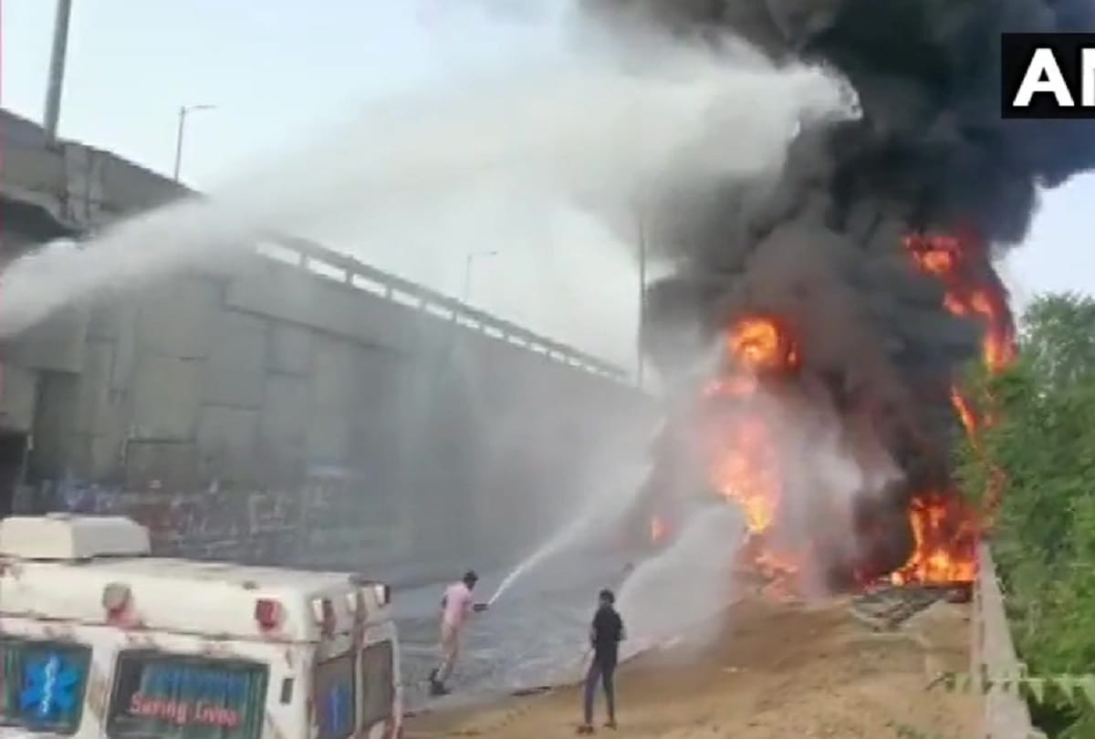 Truck catches fire after it falls from a flyover on Delhi Jaipur Highway near Kotputli