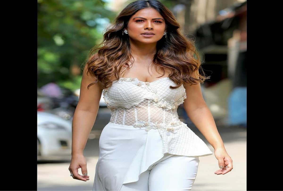 Nia Sharma new siziling photoshoot in white net dress at the ITA Awards 2022