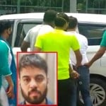 मेरठ में फर्जी डॉक्टर को ले जाती पुलिस।
