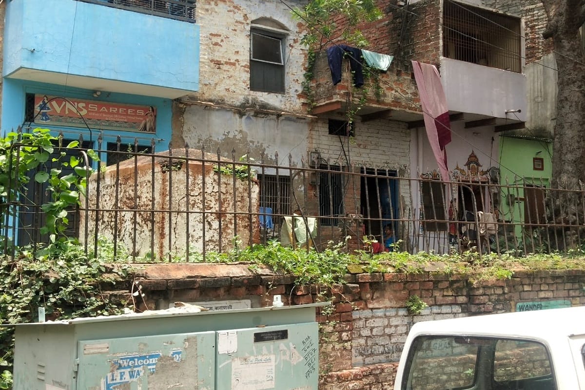heritage of kashi National monument Graves of European officers hidden in layers of carelessness in varanasi  full of dirt around