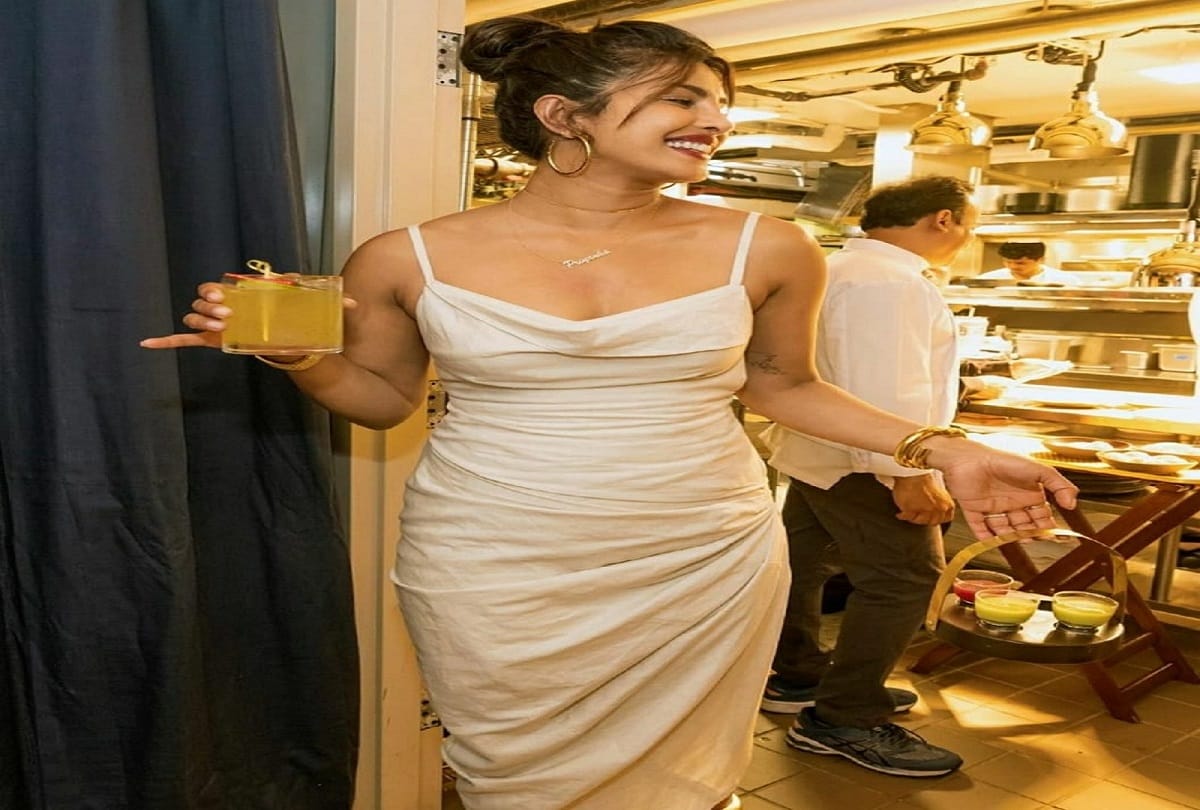 priyanka chopra white bold dress look in restaurant opening