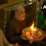आरती करते अमित शाह