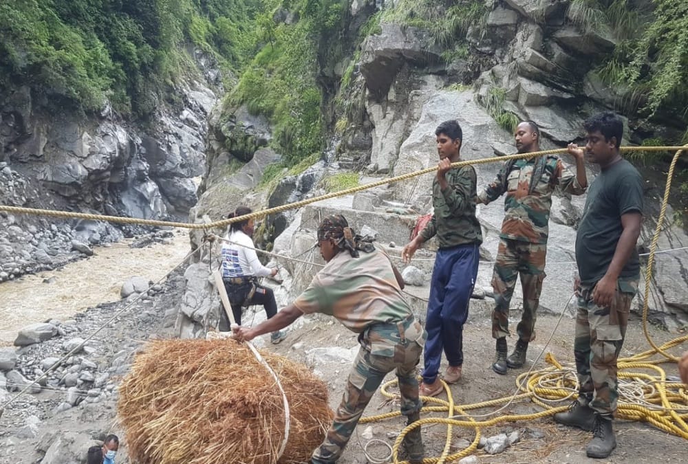 Uttarakhand Monsoon Rainfall News: People cross river in danger after Bridge Collapse in pithoragarh photos