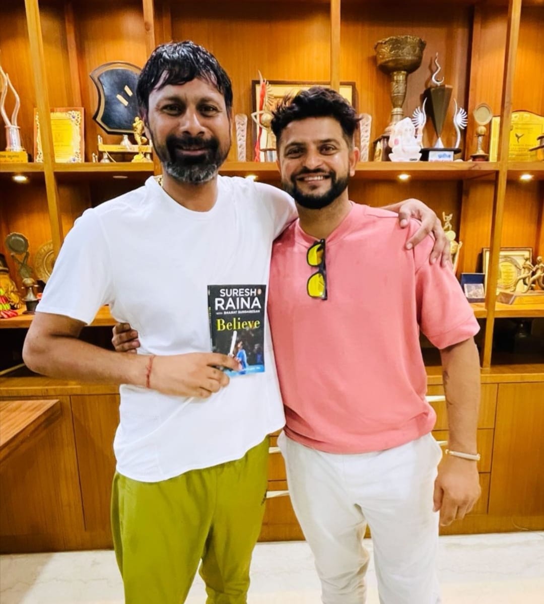 International cricketer Suresh raina gifted his biography to his friend Praveen Kumar in Meerut