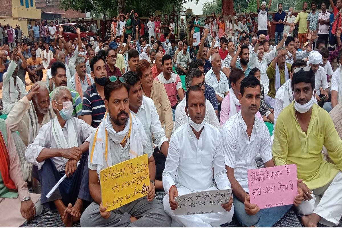 ex armymen and villagers sat on strike against railways in asia larget village gahmar in ghazipur for deamanding train stoppage