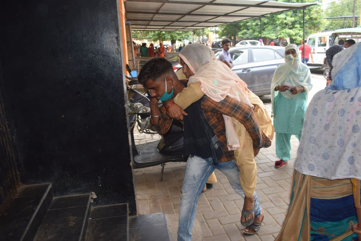 Chaos: Stretchers pulling attendants, patients lifting in lap