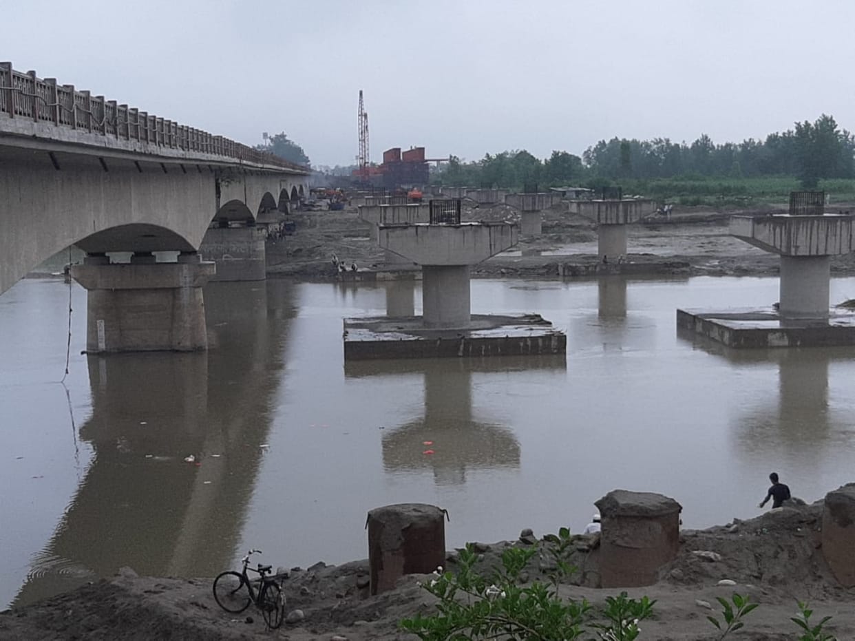 Bridge construction halted due to rise in water level