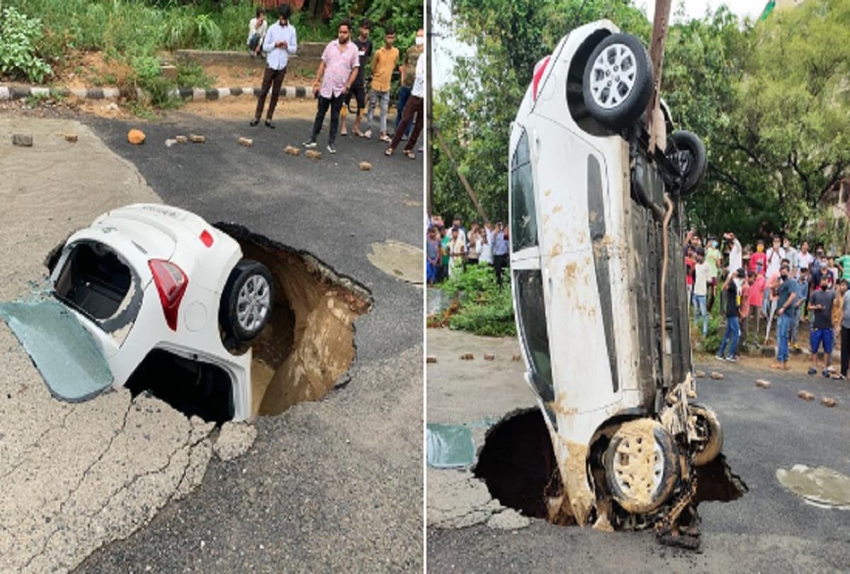 car got stuck after road caved in Dwarka of delhi due to incessant rain in National Capital