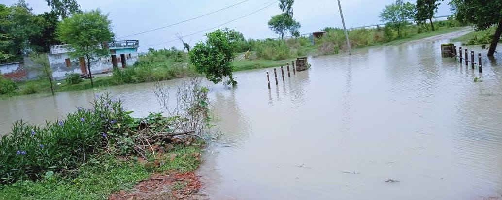 Rivers swelled, water flowing over the sliding bridge