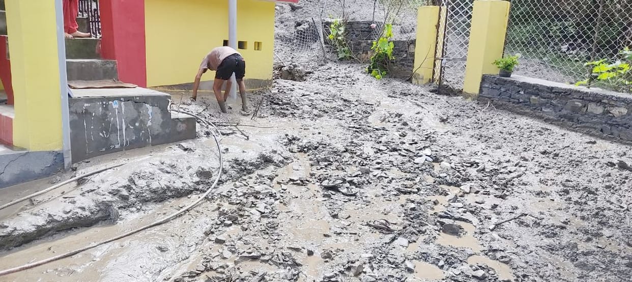 Machine buried in rubble, Gaushala-three toilets