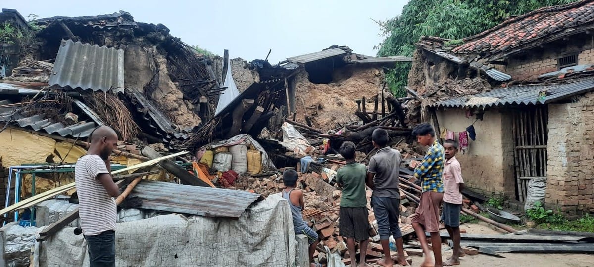 House collapsed family buried under debris from rain many injured two died in mau