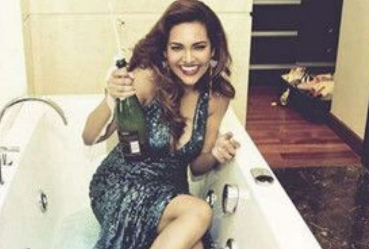Esha Gupta's topless photo wearing NOTHING but baggy jeans goes viral