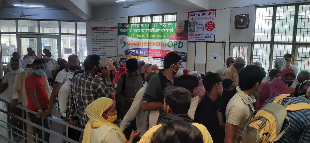 Crowd of patients in civil hospital giving feast to corona infection