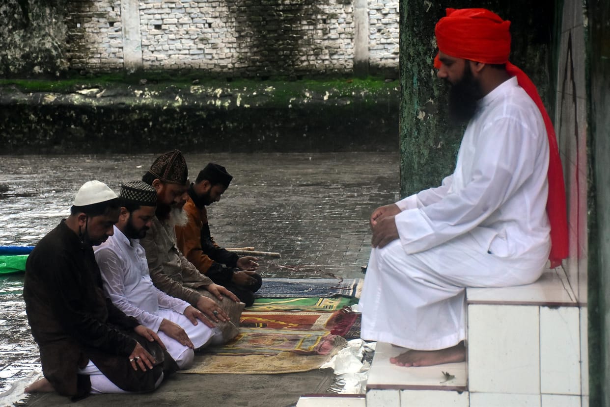 Eid prayers held amidst raining mercy