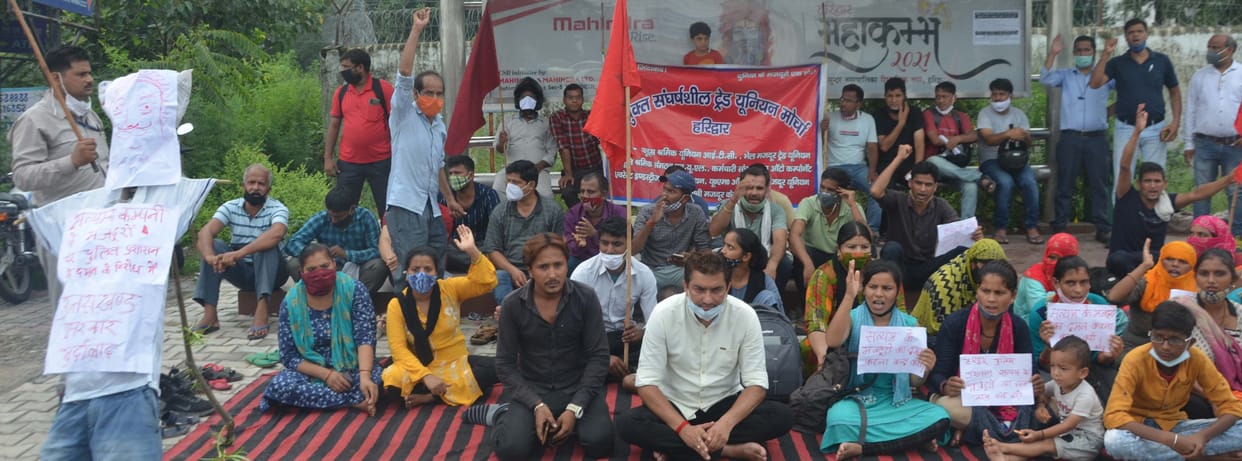 Forcibly picked up people who were protesting outside the company