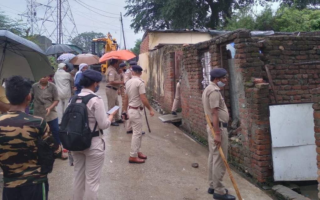 JCB's claw on encroachment