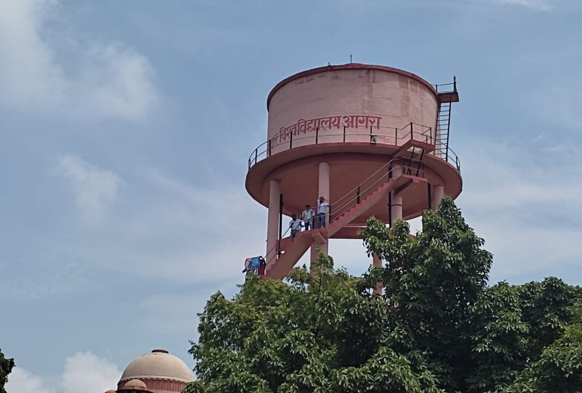 Nsui Workers Protest Climb On Water Tank In University