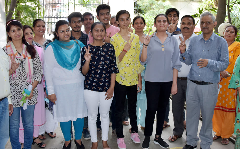 Ayushi in 10th and Rohan Rajput became district topper in 12th