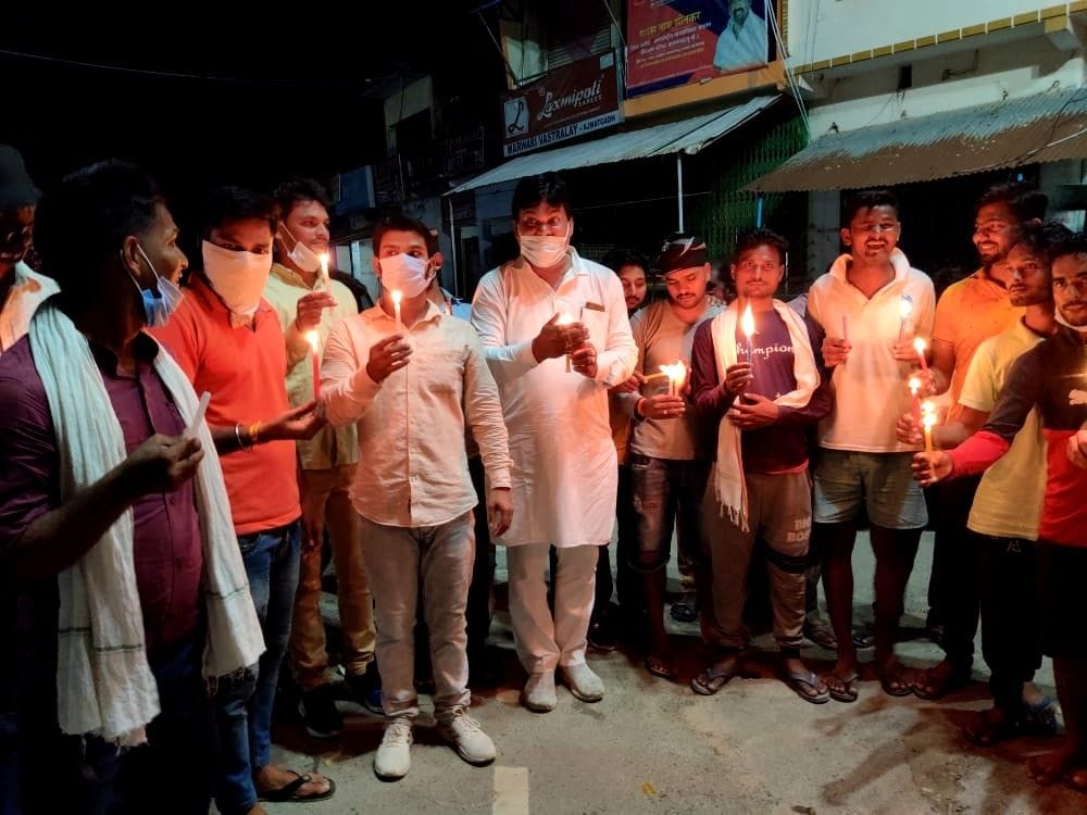 Candle march was taken out to pay tribute to the dead from Corona