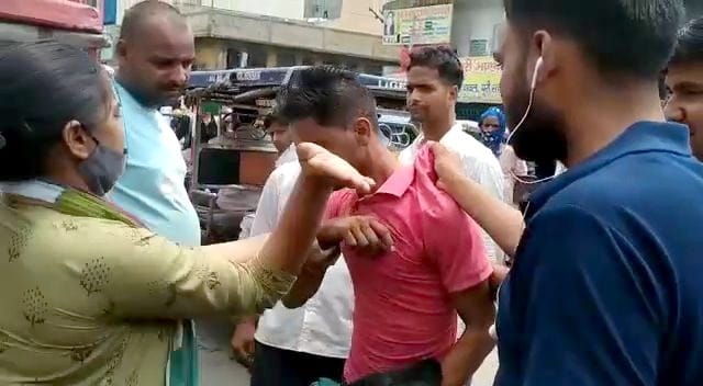 The girl slapped the young man for molesting