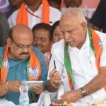 बसवराज बोम्मई और बीएस येदियुरप्पा।