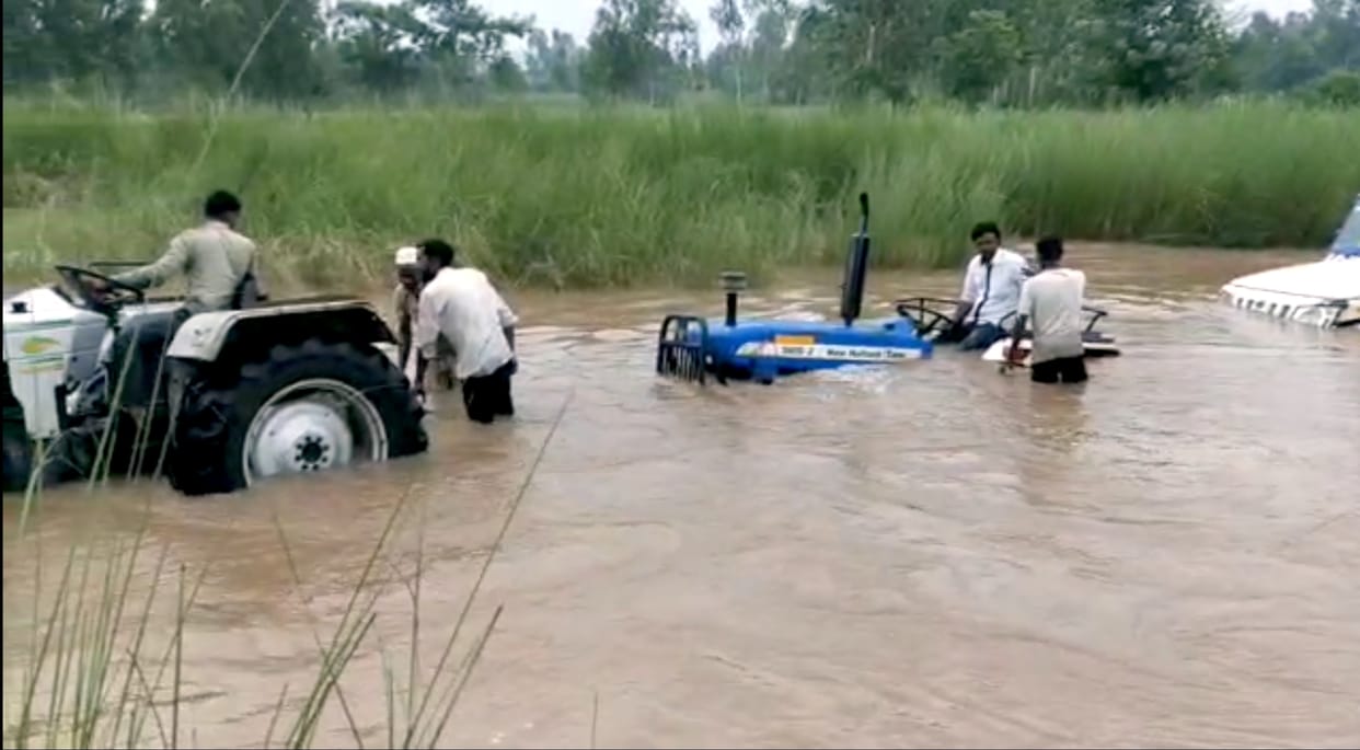 Two tractors that went to remove the vehicle also got stuck in the river