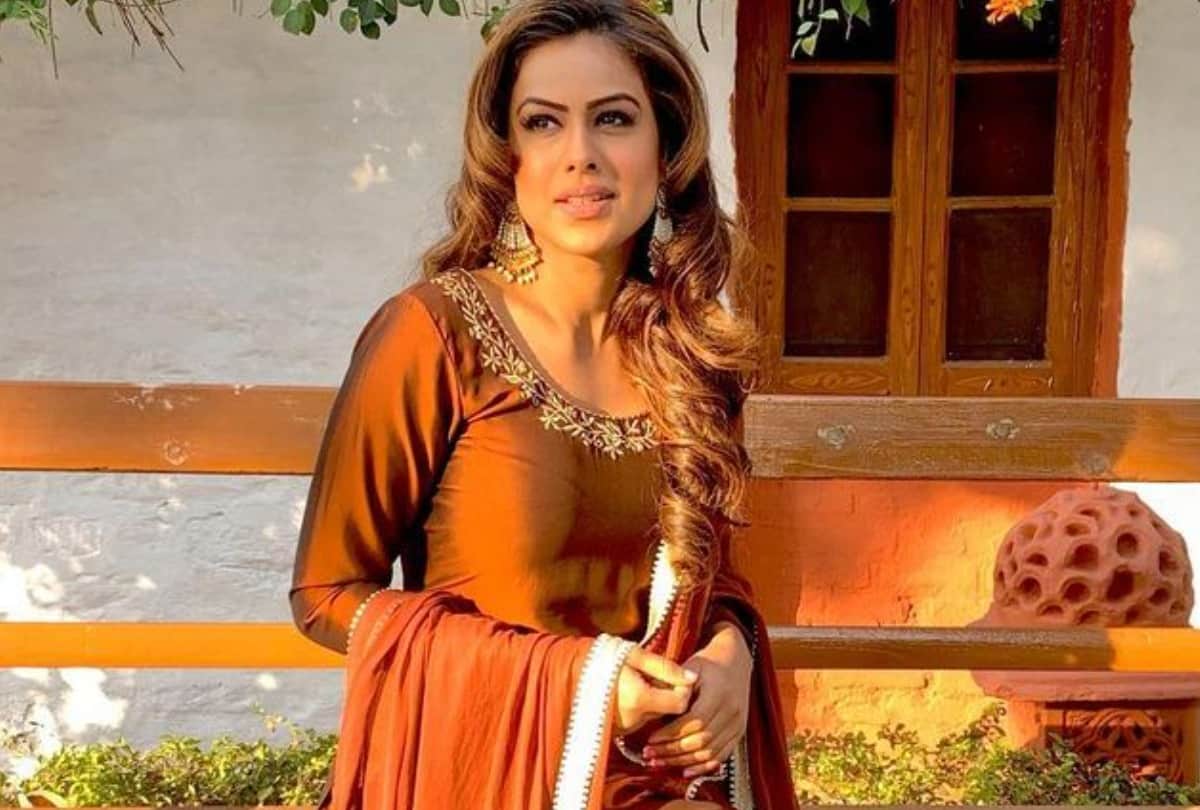 nia sharma gorgeous white lehenga in brother wedding look stunning