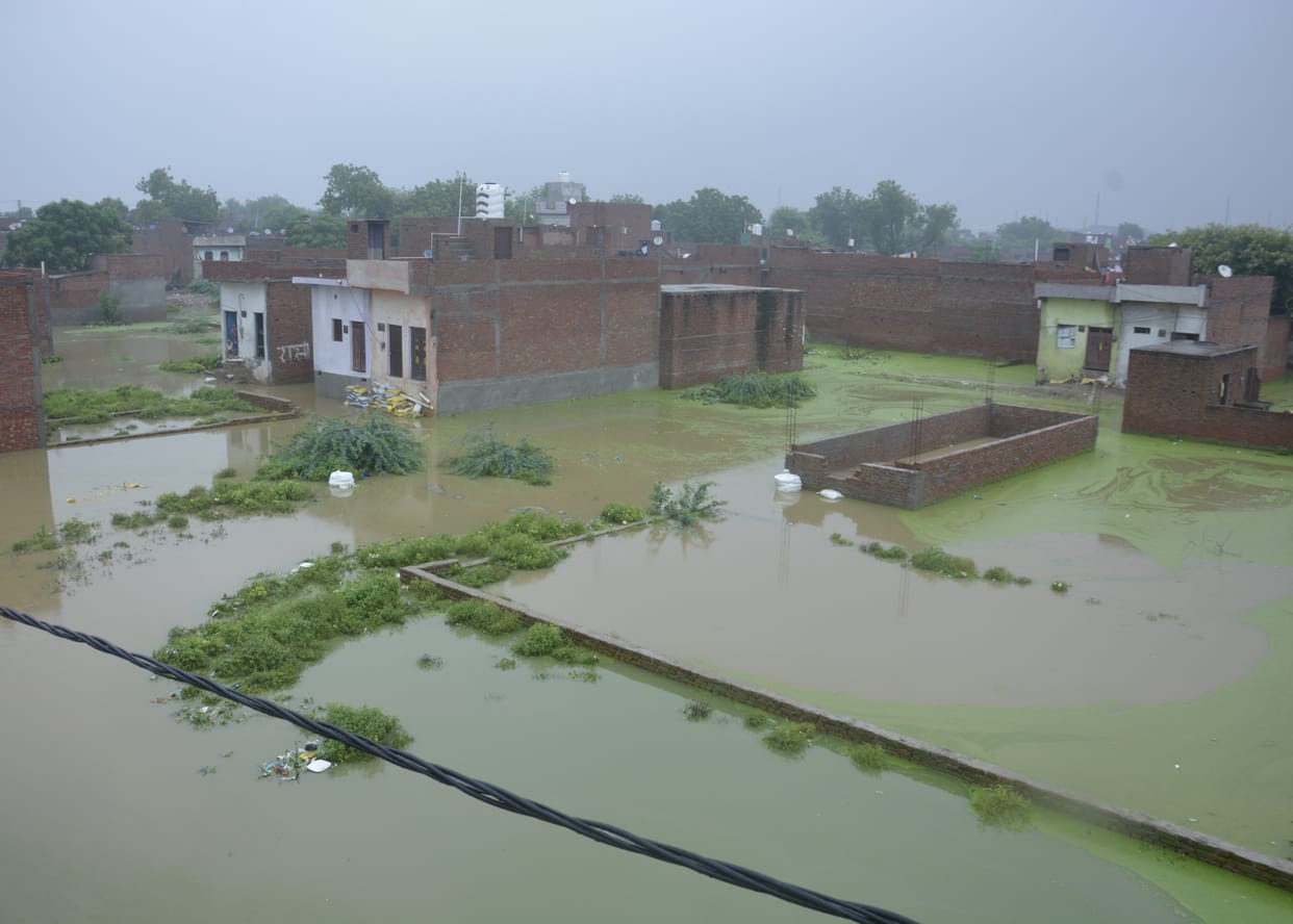 Rain became a disaster, water filled the houses in the new population, floating goods