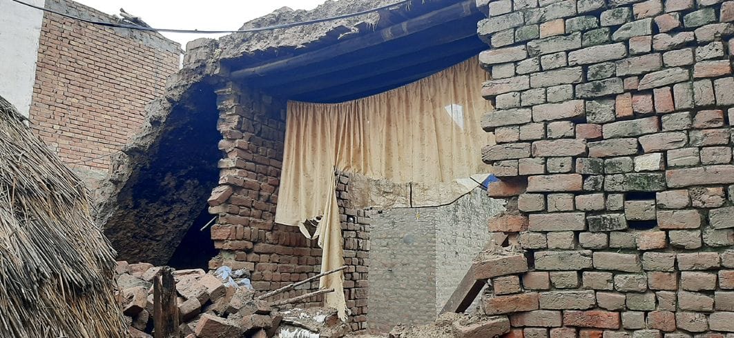 It rained on the second day too, the wall of one house and the roof of the other fell