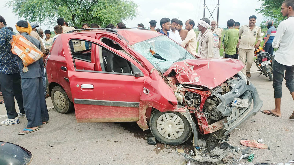 Two youths died in car and bike collision