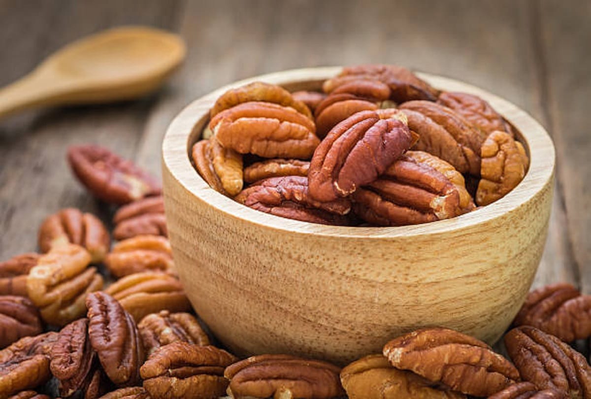 Walnut like this thing Rich in Vitamin e Health benefits and side effects of pecan nuts