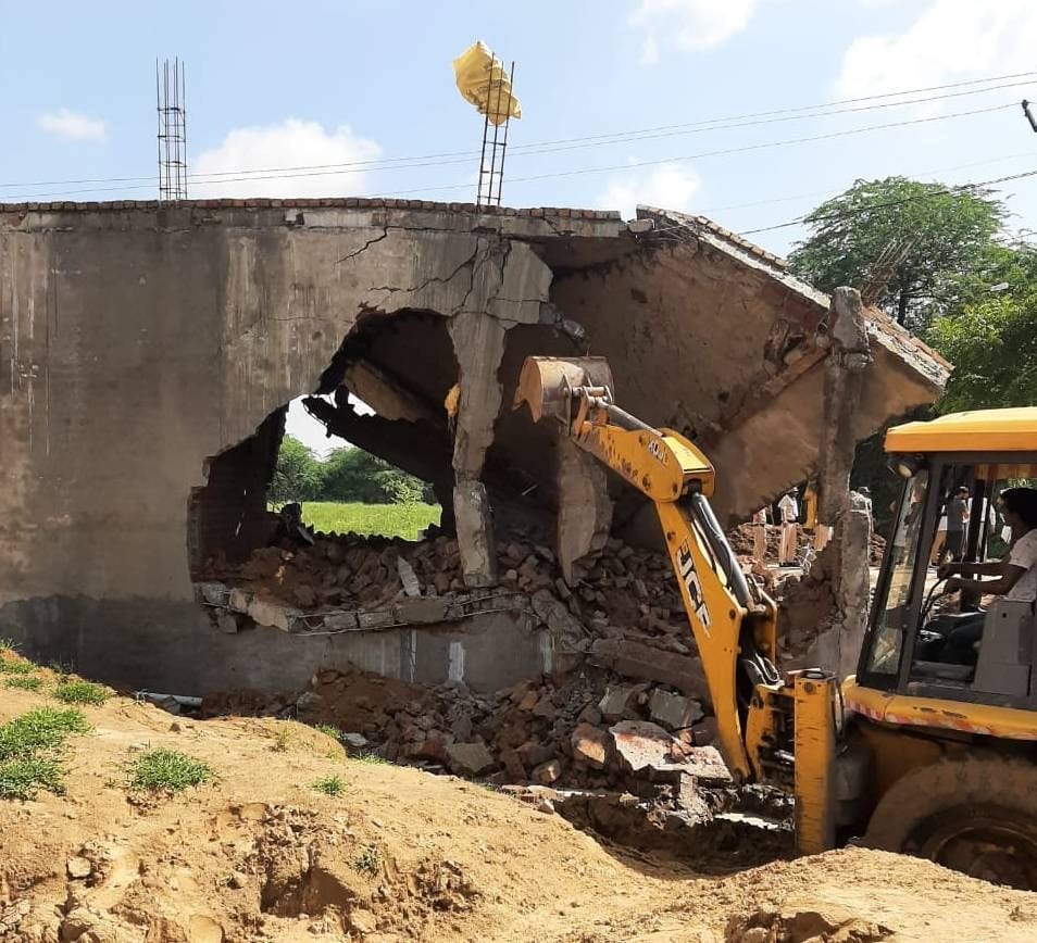 Demolition of construction in illegal colony developed in two and a half acres of land